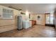 Spacious laundry room with washer, dryer and exterior access at 3916 W Oklahoma Ave, Tampa, FL 33616