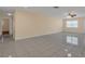 Spacious living room with tile floors and ceiling fan at 3916 W Oklahoma Ave, Tampa, FL 33616