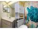Clean bathroom with a shower/tub and updated vanity at 400 64Th Ave # 508, St Pete Beach, FL 33706