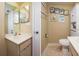 Bathroom with toilet and sink vanity at 400 64Th Ave # 508, St Pete Beach, FL 33706