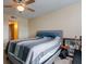 Bedroom with a queen bed and access to hallway at 400 64Th Ave # 508, St Pete Beach, FL 33706