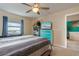 Main bedroom with king-size bed and dresser, plus ocean view at 400 64Th Ave # 508, St Pete Beach, FL 33706