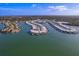 Aerial view of waterfront community showcasing unique layout and boat access at 407 Boca Ciega Point N Blvd, St Petersburg, FL 33708