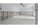 Bedroom under construction with exposed framing and tile floors at 407 Boca Ciega Point N Blvd, St Petersburg, FL 33708