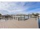 Large composite dock with boat lifts, offering stunning water views at 407 Boca Ciega Point N Blvd, St Petersburg, FL 33708