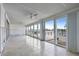 Living area with water views and sliding glass doors at 407 Boca Ciega Point N Blvd, St Petersburg, FL 33708