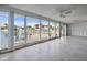 Bright living room with water views and sliding glass doors at 407 Boca Ciega Point N Blvd, St Petersburg, FL 33708