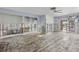 Living area under renovation, showing new framing and flooring at 407 Boca Ciega Point N Blvd, St Petersburg, FL 33708