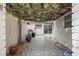 Brick paved patio with pergola and grill area at 407 Boca Ciega Point N Blvd, St Petersburg, FL 33708