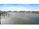 Tranquil waterfront view with neighboring houses and boats at 407 Boca Ciega Point N Blvd, St Petersburg, FL 33708