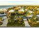 Bird's eye view of waterfront home, showcasing the property and neighborhood at 608 Florida Blvd, Crystal Beach, FL 34681
