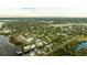 Aerial view of waterfront homes and community at 608 Florida Blvd, Crystal Beach, FL 34681