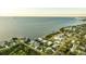 Aerial view of waterfront homes and community at 608 Florida Blvd, Crystal Beach, FL 34681
