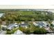 Property view showcasing home, backyard, and surrounding neighborhood at 608 Florida Blvd, Crystal Beach, FL 34681