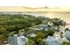Waterfront property view, showing home, landscaping, and neighborhood at 608 Florida Blvd, Crystal Beach, FL 34681