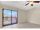 Bright bedroom featuring tile floors and a large window overlooking a peaceful outdoor scenery at 6210 92Nd N Pl # 3405, Pinellas Park, FL 33782