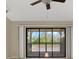 View from a living room featuring a sliding door leading to a screened porch at 6210 92Nd N Pl # 3405, Pinellas Park, FL 33782