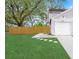 Newly landscaped front yard with a spacious lawn at 6263 Oak Cluster Cir, Tampa, FL 33634