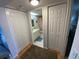 Clean bathroom with a vanity, toilet and bathtub at 7050 Sunset S Dr # 208, South Pasadena, FL 33707