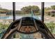 Treadmill overlooking the community pool at 7050 Sunset S Dr # 208, South Pasadena, FL 33707