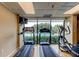 Bright fitness center with treadmills and great views at 7050 Sunset S Dr # 208, South Pasadena, FL 33707