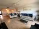 Bright living room with comfortable sofas and hardwood floors at 7050 Sunset S Dr # 208, South Pasadena, FL 33707