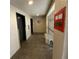 Lobby with elevators, seating, and a fire alarm at 7050 Sunset S Dr # 208, South Pasadena, FL 33707
