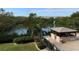 Relaxing pool and spa area with gazebo and water views at 7050 Sunset S Dr # 208, South Pasadena, FL 33707