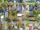 Aerial view showcasing a house amongst other properties at 7711 N Orleans Ave, Tampa, FL 33604