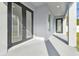 Covered back patio with access from the living area at 7711 N Orleans Ave, Tampa, FL 33604