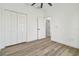 Spacious bedroom with hardwood floors and ample closet space at 7711 N Orleans Ave, Tampa, FL 33604