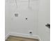 Laundry closet with hookups and extra storage space at 7711 N Orleans Ave, Tampa, FL 33604