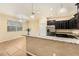 Eat-in kitchen with granite countertops and dark wood cabinets at 8110 Hampton View Ln, Tampa, FL 33647