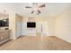 Spacious living room with tile floors and access to a back patio at 8110 Hampton View Ln, Tampa, FL 33647