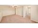 Spacious loft area with carpet and ceiling fan at 8110 Hampton View Ln, Tampa, FL 33647