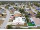 Aerial view of a residential neighborhood showing home's location and features at 9229 Haverford Ln, Port Richey, FL 34668