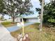 Front view of a single Gathering home with a mailbox and driveway at 9334 Ledgestone Ln, Port Richey, FL 34668