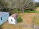 Backyard with shed and mature oak tree at 9415 Forest Hills Dr, Tampa, FL 33612