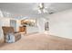 Spacious living room with a view of the kitchen at 9422 Bellhaven St, Temple Terrace, FL 33637