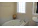 Relaxing bathroom with soaking tub and updated sink at 960 Lakewood Dr, Dunedin, FL 34698