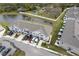 Aerial view of townhouses near a pond at 9642 Sweetwell Pl, Riverview, FL 33569