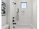 Contemporary bathroom with a shower and white subway tile at 108 E Chelsea St, Tampa, FL 33603