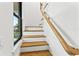 Modern staircase with wooden treads and white risers at 108 E Chelsea St, Tampa, FL 33603