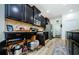 Well-organized kitchen with pull-out drawers and pantry at 11036 Paradise Point Way, New Port Richey, FL 34654