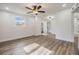 Main bedroom with ceiling fan, hardwood floors and lots of light at 11882 104Th St, Largo, FL 33773