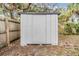 White metal storage shed in backyard at 11882 104Th St, Largo, FL 33773