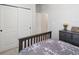 Bright bedroom with double bed, dresser and closet at 12772 Achasta Blvd, Hudson, FL 34669