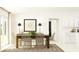 Bright dining room with wood table and wicker chairs at 13078 Ruby Gold Ct, Wimauma, FL 33598