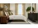 Bedroom with a bed, dresser, and neutral color scheme at 13582 Newbridge St, Spring Hill, FL 34609