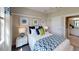 Charming bedroom with window and en-suite bathroom at 14952 Serene Shores Loop, Lakewood Ranch, FL 34211